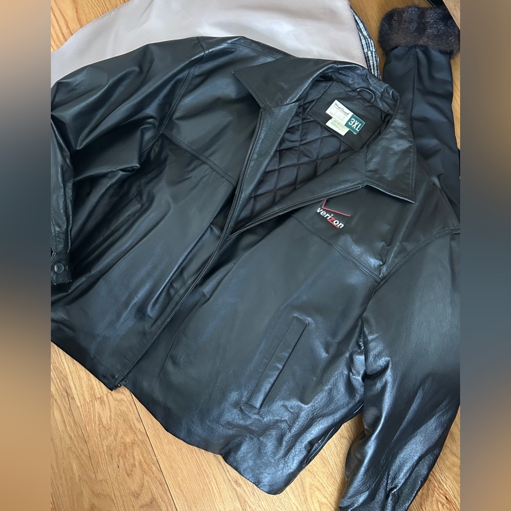 Black leather jacket with quilted lining and Verizon logo